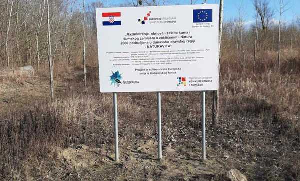 Picture of a sign regarding the process of demining in Croatia